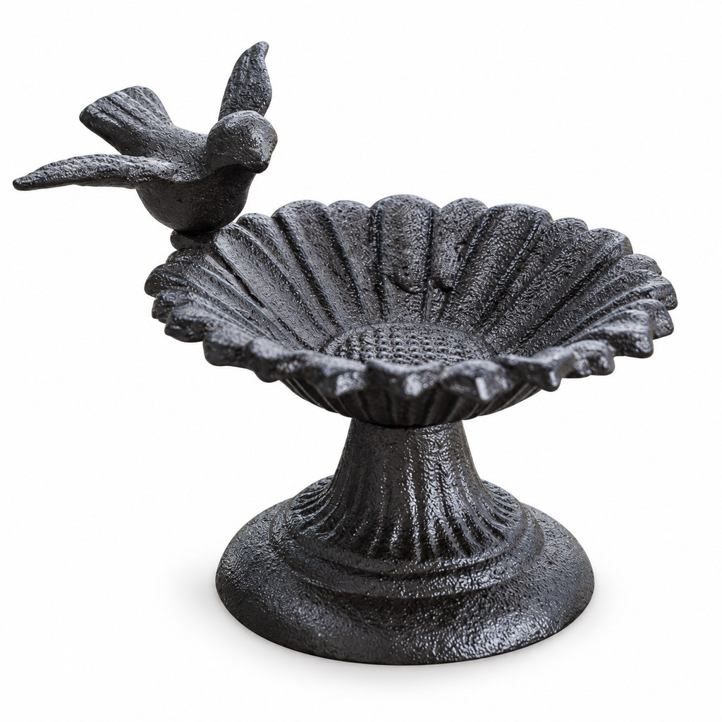 Black cast iron flower bowl bird feeder with sculpted bird and pedestal on white background